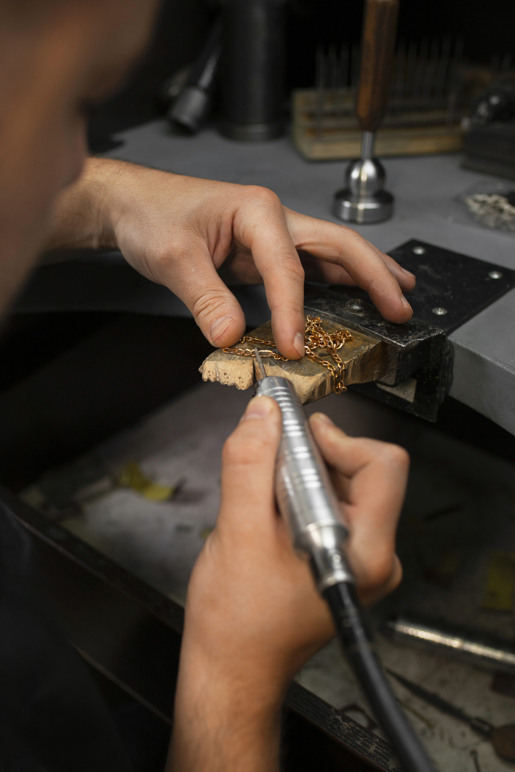 jeweler-s-hands-making-jewellery jeweler-s-hands-making-jewellery